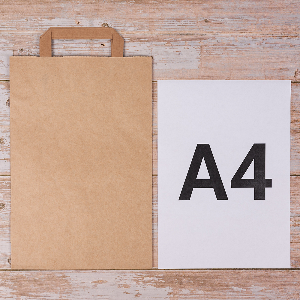 Крафт пакет с плоской ручкой, 70 г/м², 22*9*33 см Крафт пакет с плоской ручкой, 70 г/м², 22*9*33 см