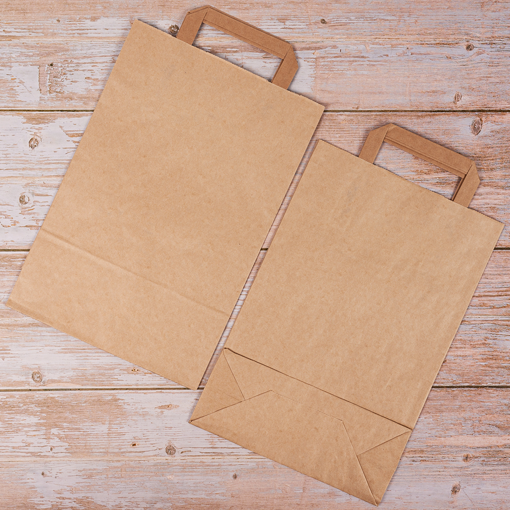 Крафт пакет с плоской ручкой, 70 г/м², 22*9*33 см Крафт пакет с плоской ручкой, 70 г/м², 22*9*33 см