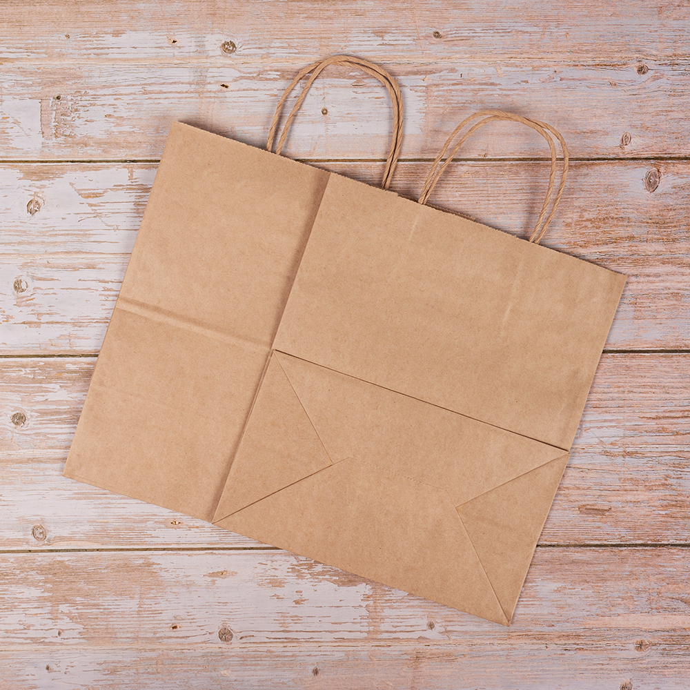 Крафт пакет с крученой ручкой, 70 г/м², 24*14*28 см Крафт пакет с крученой ручкой, 70 г/м², 24*14*28 см