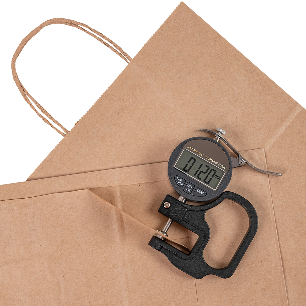 Крафт пакет с крученой ручкой, 70 г/м², 24*14*28 см Крафт пакет с крученой ручкой, 70 г/м², 24*14*28 см